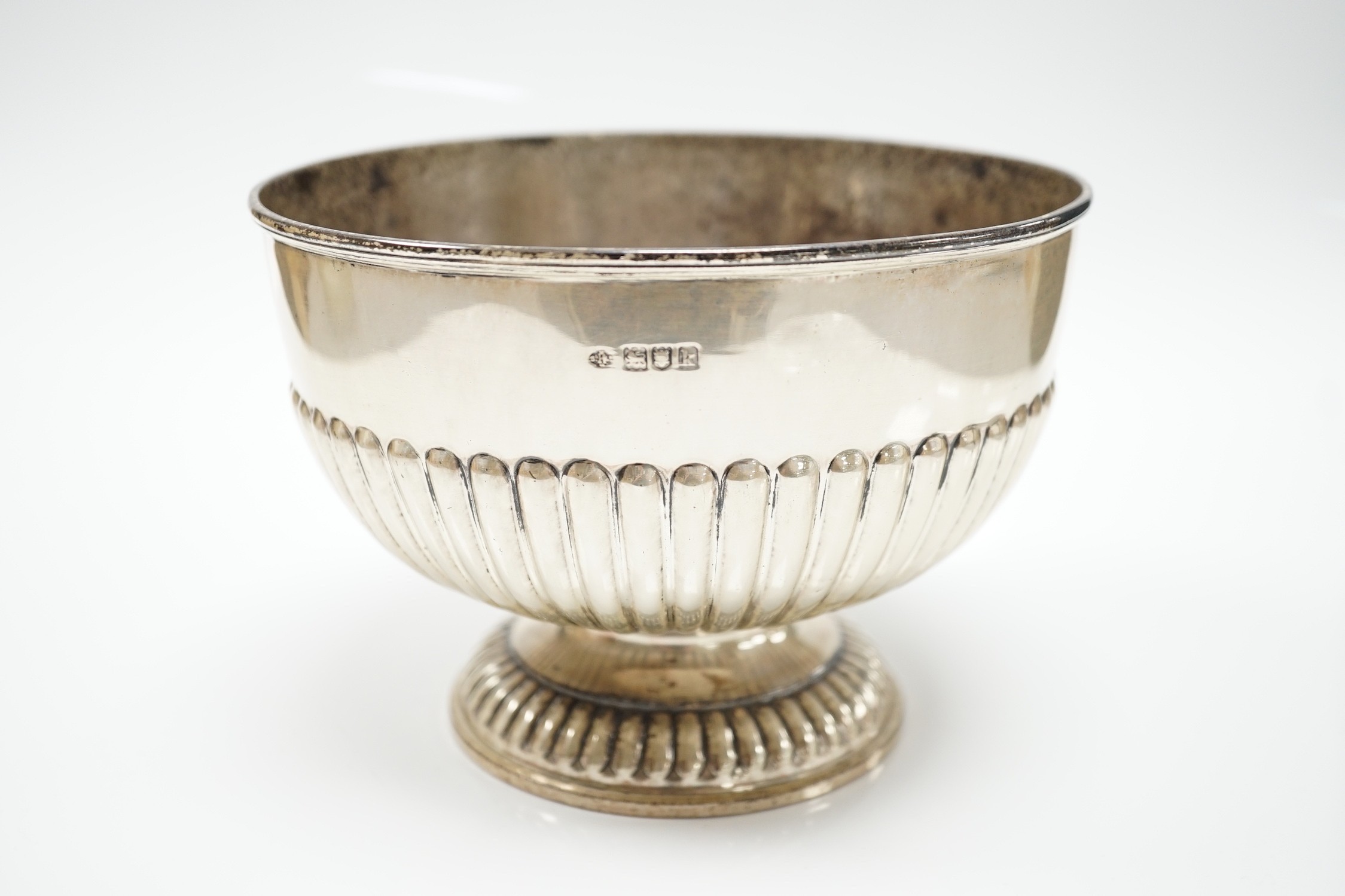 An Edwardian demi fluted silver presentation rose bowl, William Hutton & Sons, London, 1905, diameter 16.1cm, 11oz.